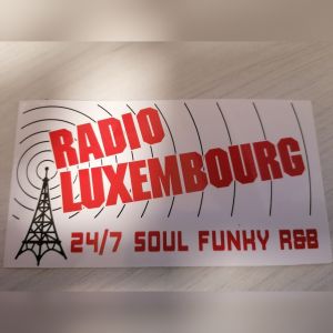 Logotipo de la emisora ​​de radio Radio Luxembourg 523